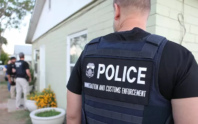 ICE officers conduct an enforcement action in this file photo from the federal agency. - U.S. Immigration and Customs Enforcement via wikimedia