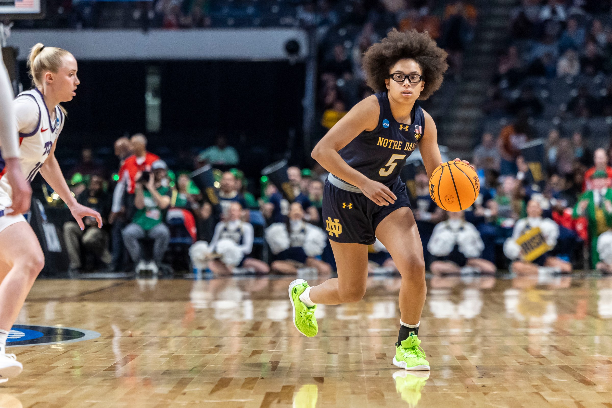Mar 29, 2025; Birmingham, AL, USA; Notre Dame Fighting Irish guard Olivia Miles (5) works the ball down the court against the TCU Horned Frogs during the first half of a Sweet 16 NCAA Tournament basketball game at Legacy Arena. Mandatory Credit: Vasha Hunt-Imagn Images