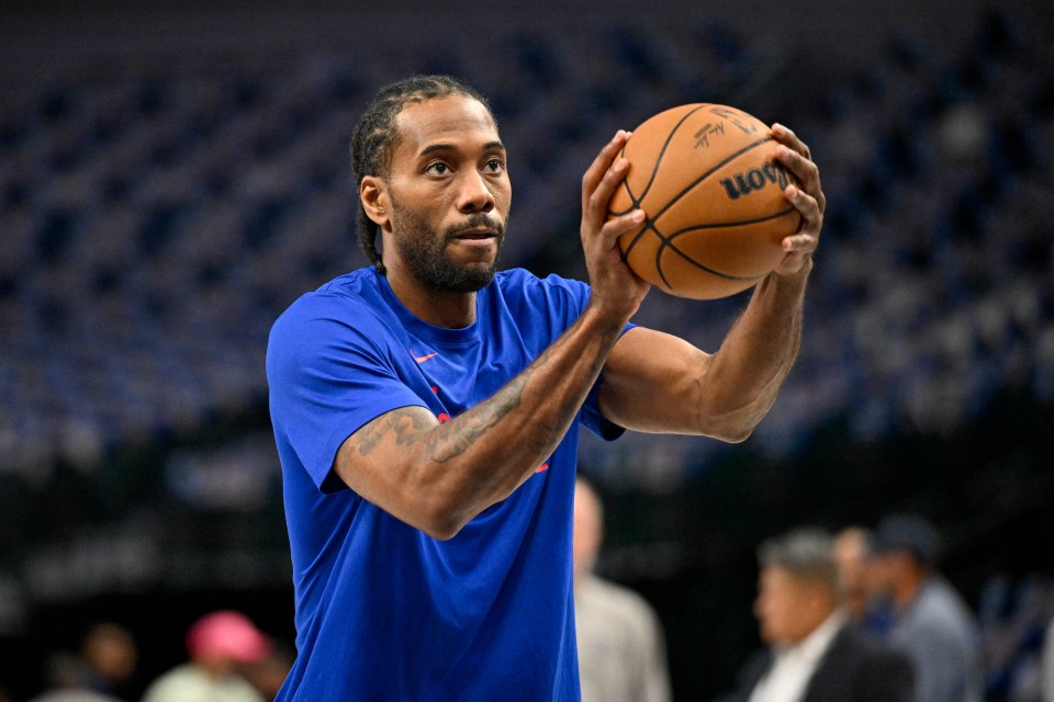 Kawhi Leonard warming up with a basketball.