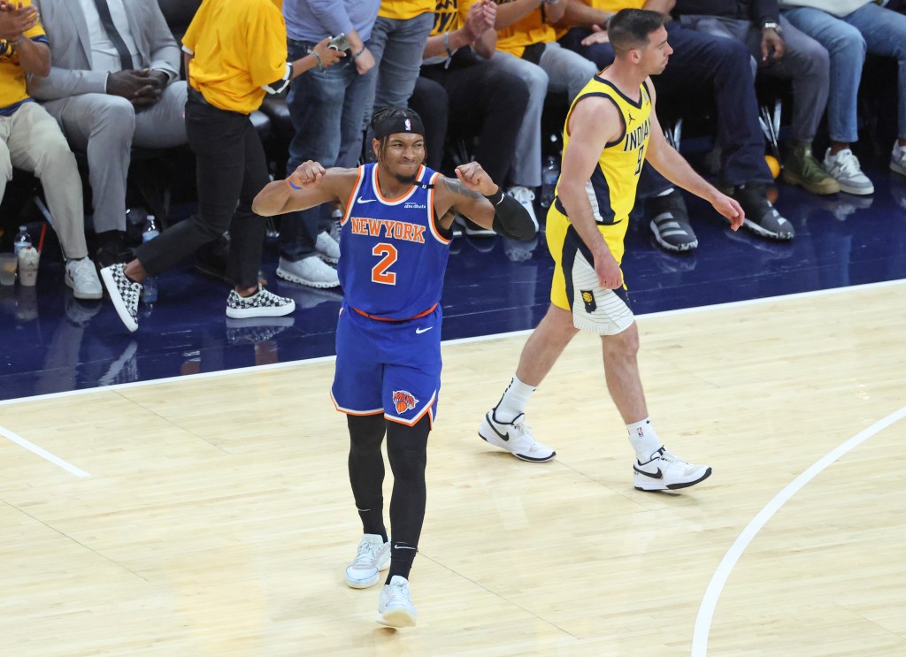 Miles McBride of the New York Knicks reacts after a missed three-point shot.