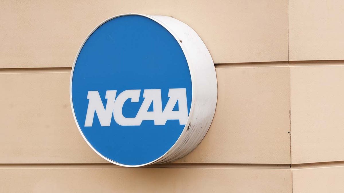The NCAA logo on entrance sign outside of the NCAA Headquarters on February 28, 2023, in Indianapolis, Indiana.  