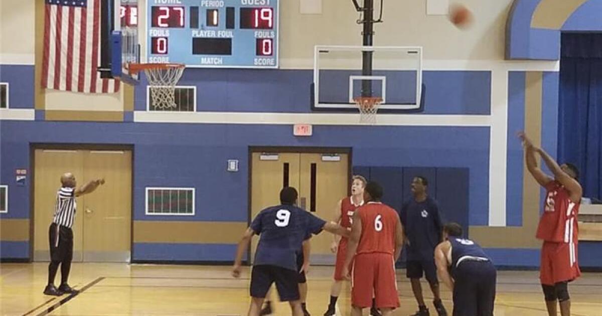 Charity basketball game features Akron Police vs. Fire in friendly showdown