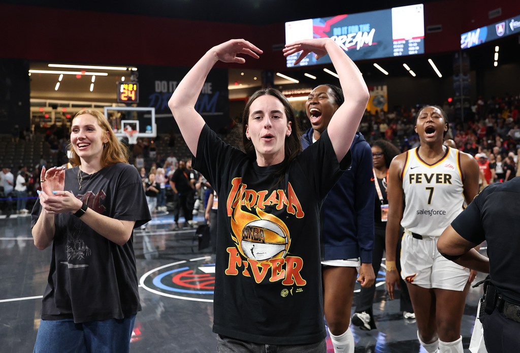 Caitlin Clark of the Indiana Fever celebrating a win.