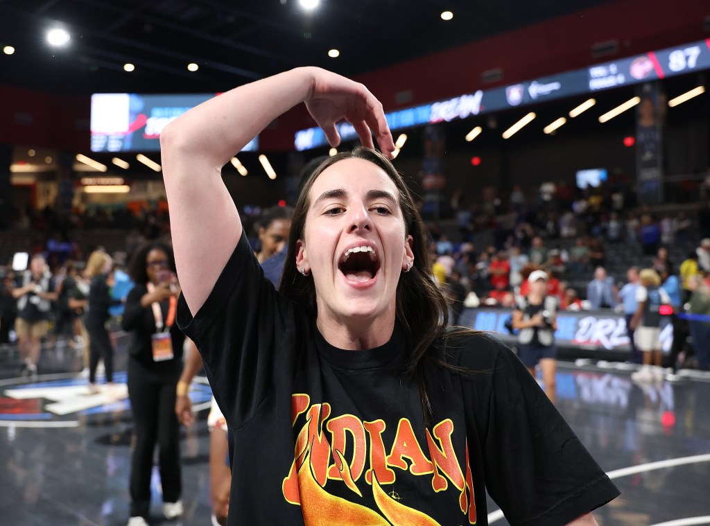 Caitlin Clark of the Indiana Fever celebrates their win.