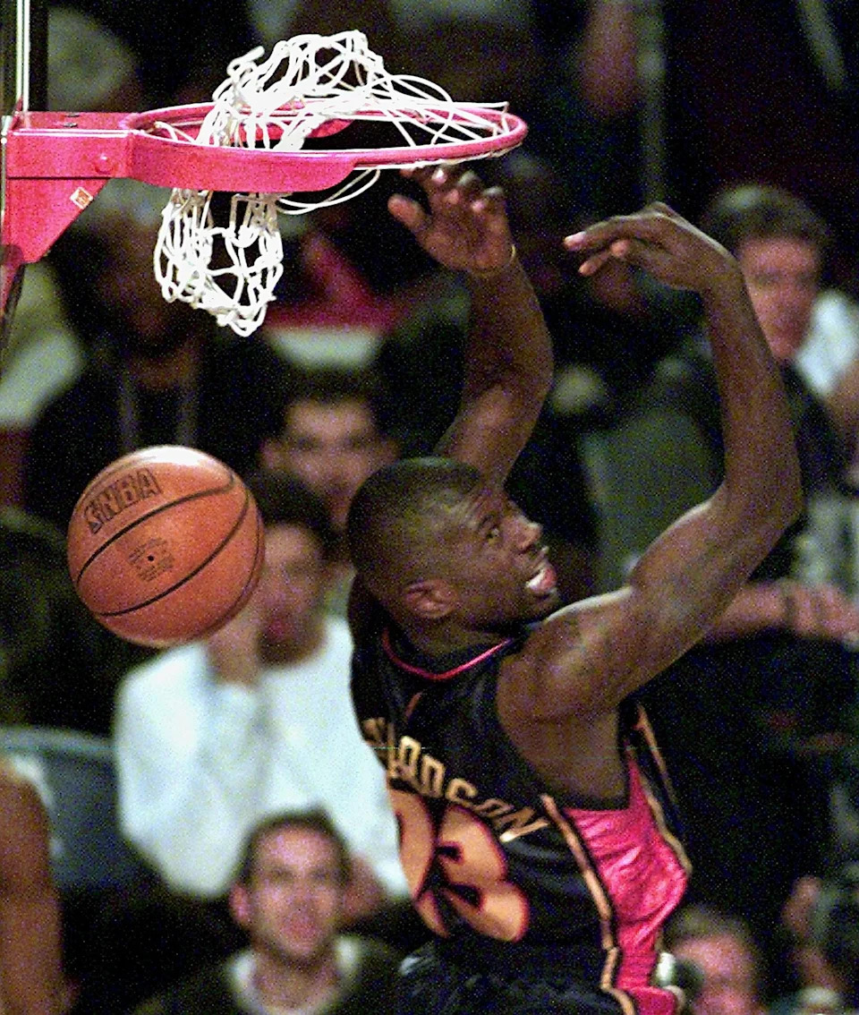 PHILADELPHIA, UNITED STATES: Jason Richardson, a guard for the Golden State Warriors, slams the winning dunk in the Slam Dunk competition, 09 February 2002, in the First Union Center, in Philadelphia, PA as part of the the All Star Game weekend.  AFP PHOTO/Paul J. RICHARDS (Photo credit should read PAUL J. RICHARDS/AFP via Getty Images)