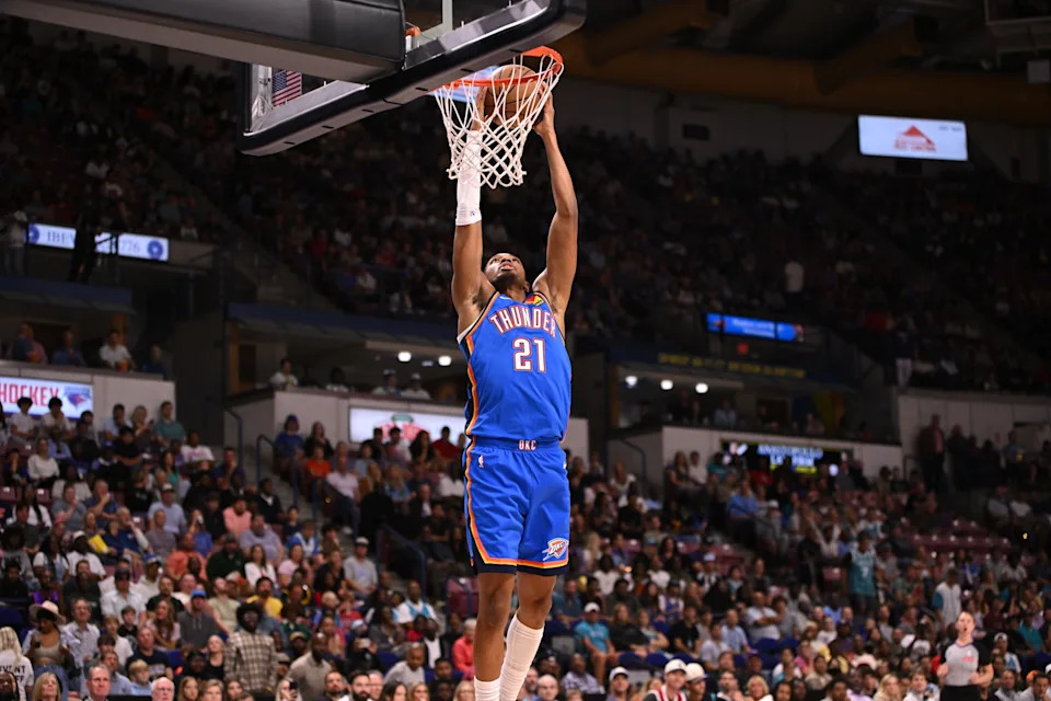 Oct 5, 2025; North Charleston, South Carolina, USA; Oklahoma City Thunder guard Aaron Wiggins (21) dunks against the Charlotte Hornets in the first quarter at North Charleston Coliseum. Mandatory Credit: Arthur Ellis-Imagn Images