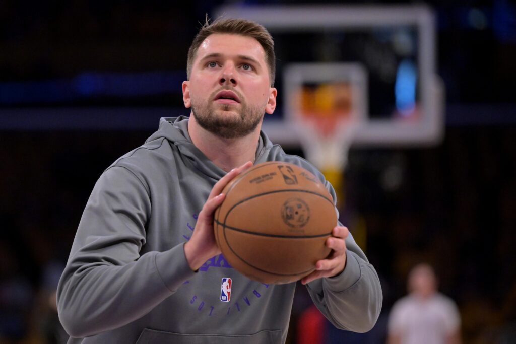 Los Angeles Lakers guard Luka Doncic warms up before a game against the Minnesota Timberwolves.