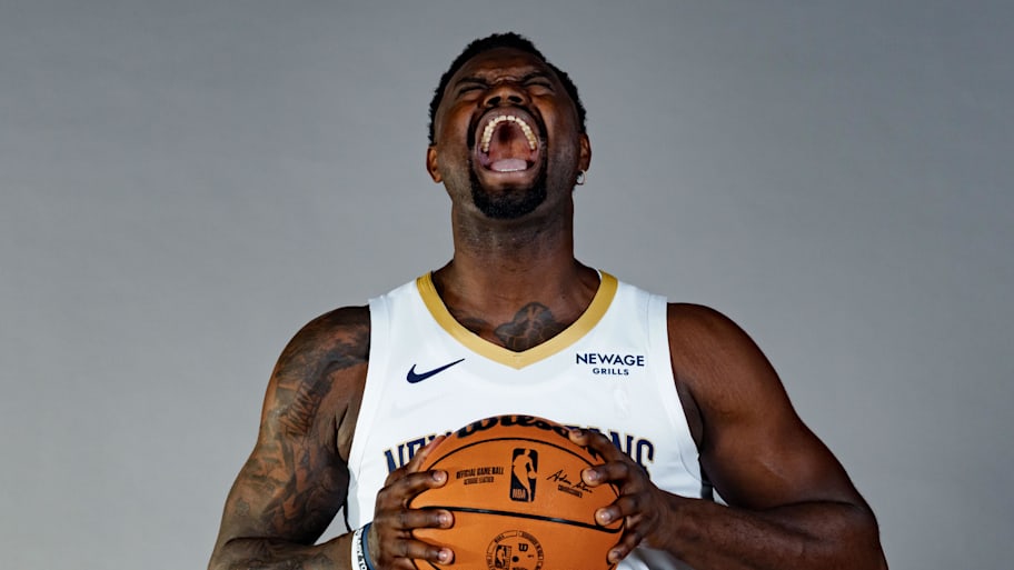 Pelicans forward Zion Williamson yells during a portrait at media day.