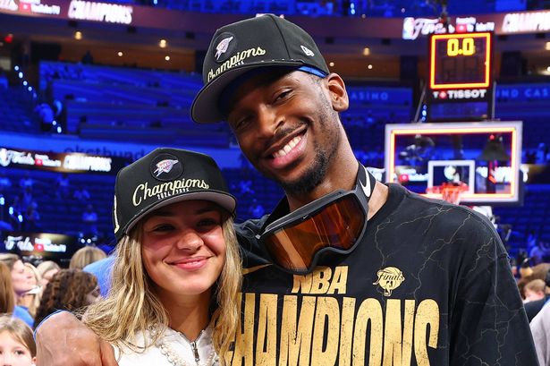 OKLAHOMA CITY, OK - JUNE 22: Hailey Summers and Shai Gilgeous-Alexander #2 of the Oklahoma City Thunder pose for a photo after winning Game Seven of the 2025 NBA Finals against the Indiana Pacers on June 22, 2025 at Paycom Center in Oklahoma City, Oklahoma. NOTE TO USER: User expressly acknowledges and agrees that, by downloading and or using this photograph, User is consenting to the terms and conditions of the Getty Images License Agreement. Mandatory Copyright Notice: Copyright 2025 NBAE (Photo by David L. Nemec/NBAE via Getty Images)