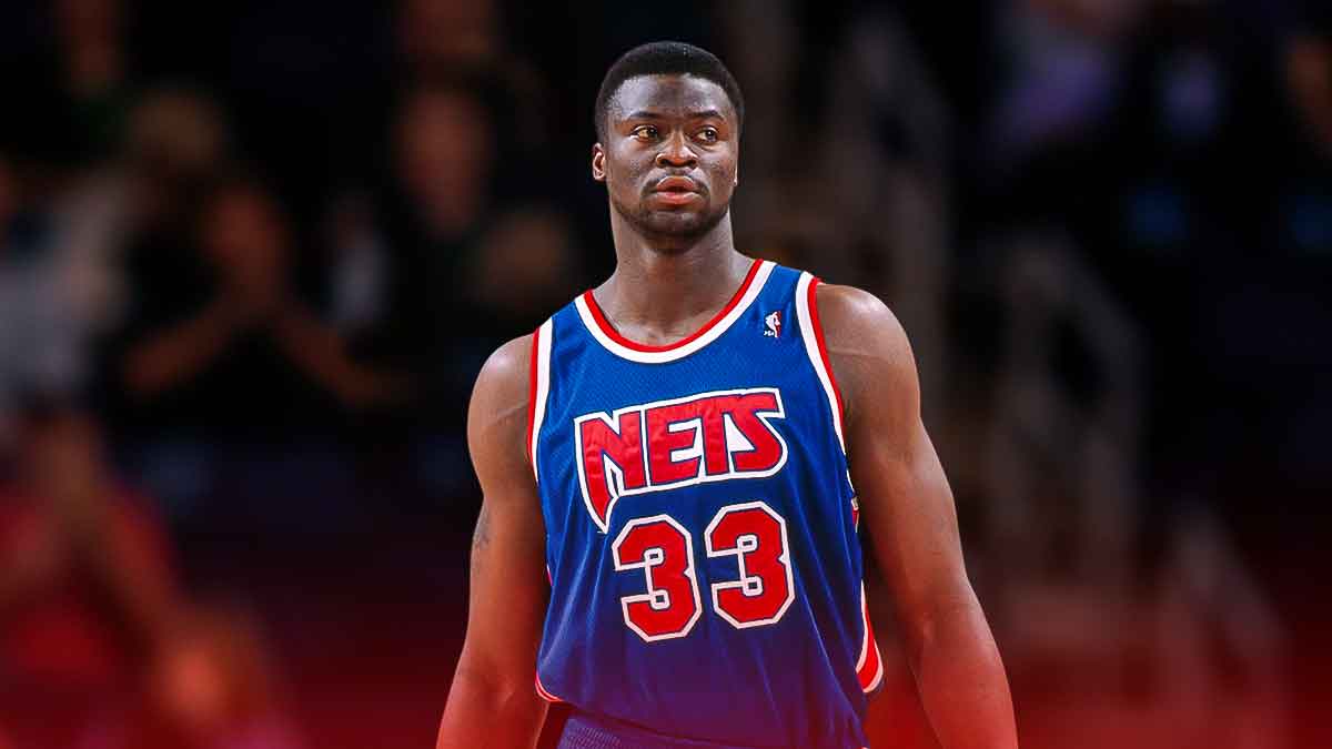 Yinka Dare playing for the Nets