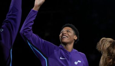 Utah Jazz forward Ace Bailey (19) smiles during introductions before a preseason NBA game against t...