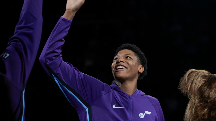 Utah Jazz forward Ace Bailey (19) smiles during introductions before a preseason NBA game against t...