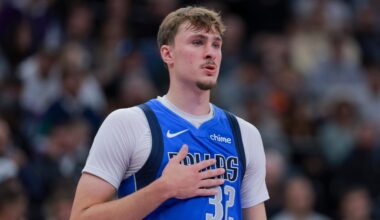 Dallas Mavericks forward Cooper Flagg (32) looks on during the first half of a preseason NBA game a...