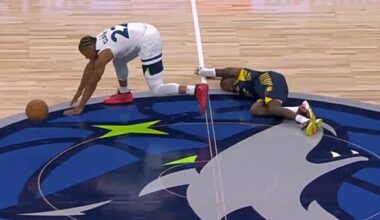 Delon Wright lays motionless on the court after colliding heads with a rival on Tuesday night