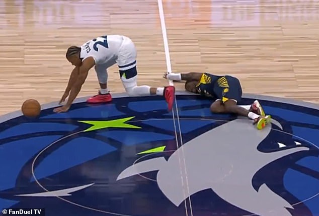 Delon Wright lays motionless on the court after colliding heads with a rival on Tuesday night