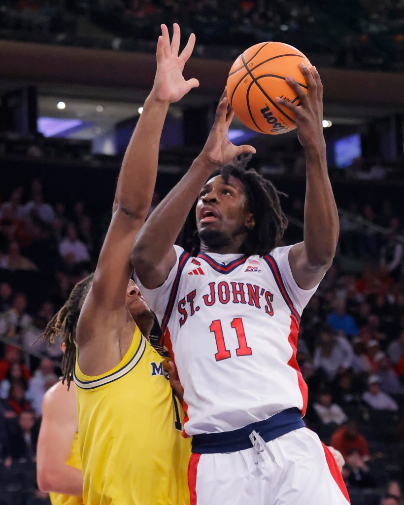 St. John's Red Storm guard Ian Jackson (11) takes a shot during the first half when the St. John's Red Storm played the Michigan Wolverines Saturday, October 25, 2025 at Madison Square Garden in Manhattan, NY. 