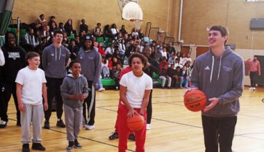 Stonehill D1 basketball players visit South Middle School