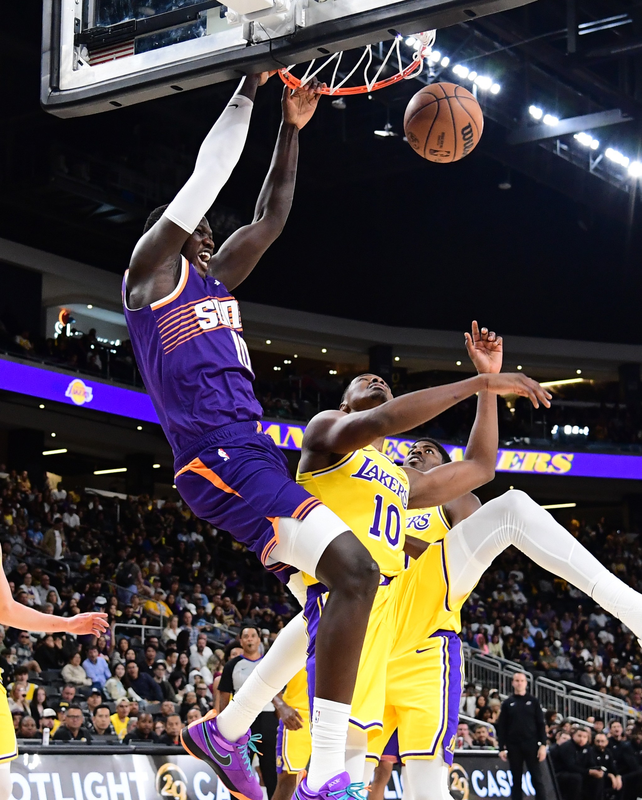 PALM SPRINGS, CA - OCTOBER 3: Khaman Maluach #10 of the Phoenix Suns dunks the ball during the game against the Los Angeles Lakers during Preseason on October 3, 2025 at Acrisure Arena in Palm Springs, California. NOTE TO USER: User expressly acknowledges and agrees that, by downloading and/or using this Photograph, user is consenting to the terms and conditions of the Getty Images License Agreement. Mandatory Copyright Notice: Copyright 2025 NBAE (Photo by Adam Pantozzi/NBAE via Getty Images)