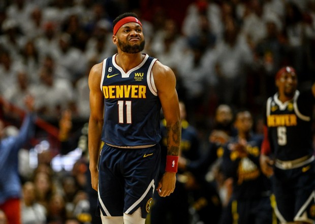 Bruce Brown (11) of the Denver Nuggets lets the Miami Heat crowd know his name in the first half of the Nuggets' 108-95 win during Game 4 of the NBA Finals at the Kaseya Center in Miami on Friday, June 9, 2023. (Photo by AAron Ontiveroz/The Denver Post)