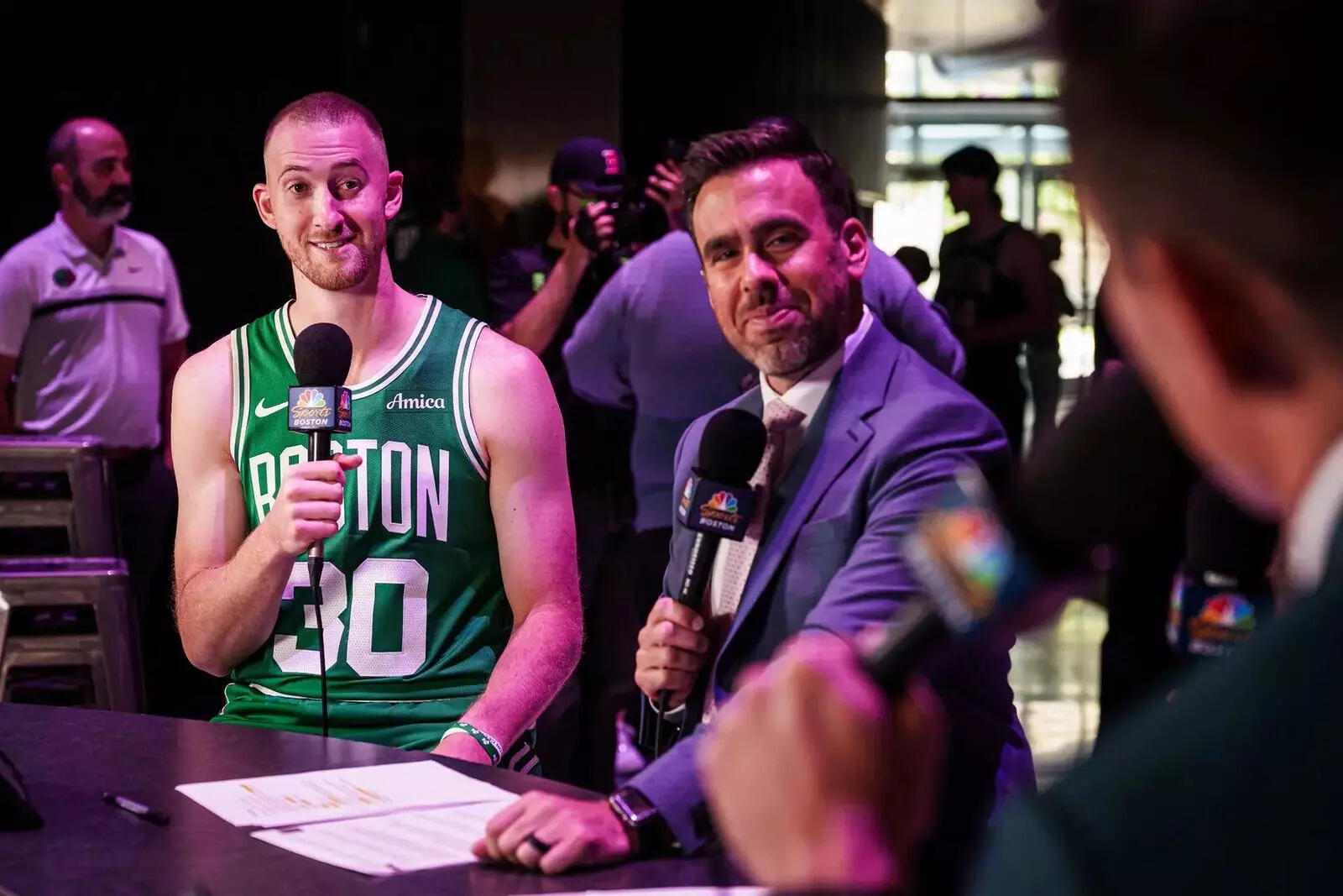 Boston Celtics forward Sam Hauser (30) talks with on air personalities during media day at the Auerbach Center (Image via Imagn) Boston Celtics forward Sam Hauser (30) talks with on air personalities during media day at the Auerbach Center