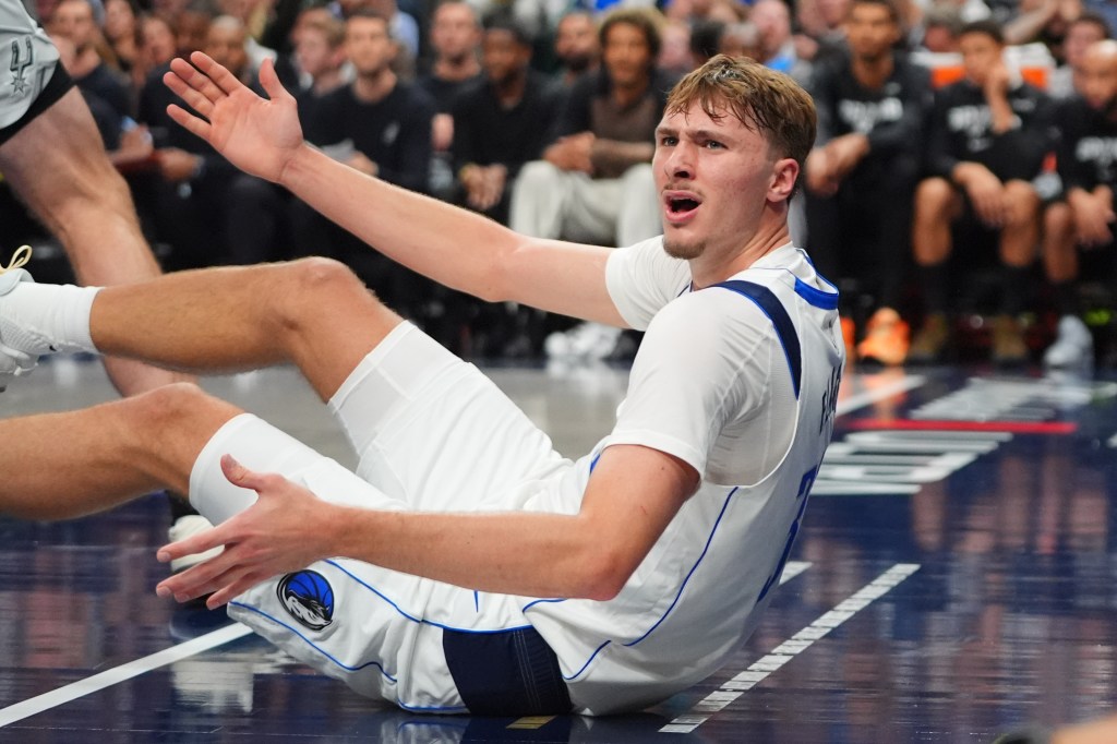 Cooper Flagg reacts in frustration after a non-foul call during the Mavericks' 125-92 blowout home loss to the Spurs on Oct. 22, 2025.