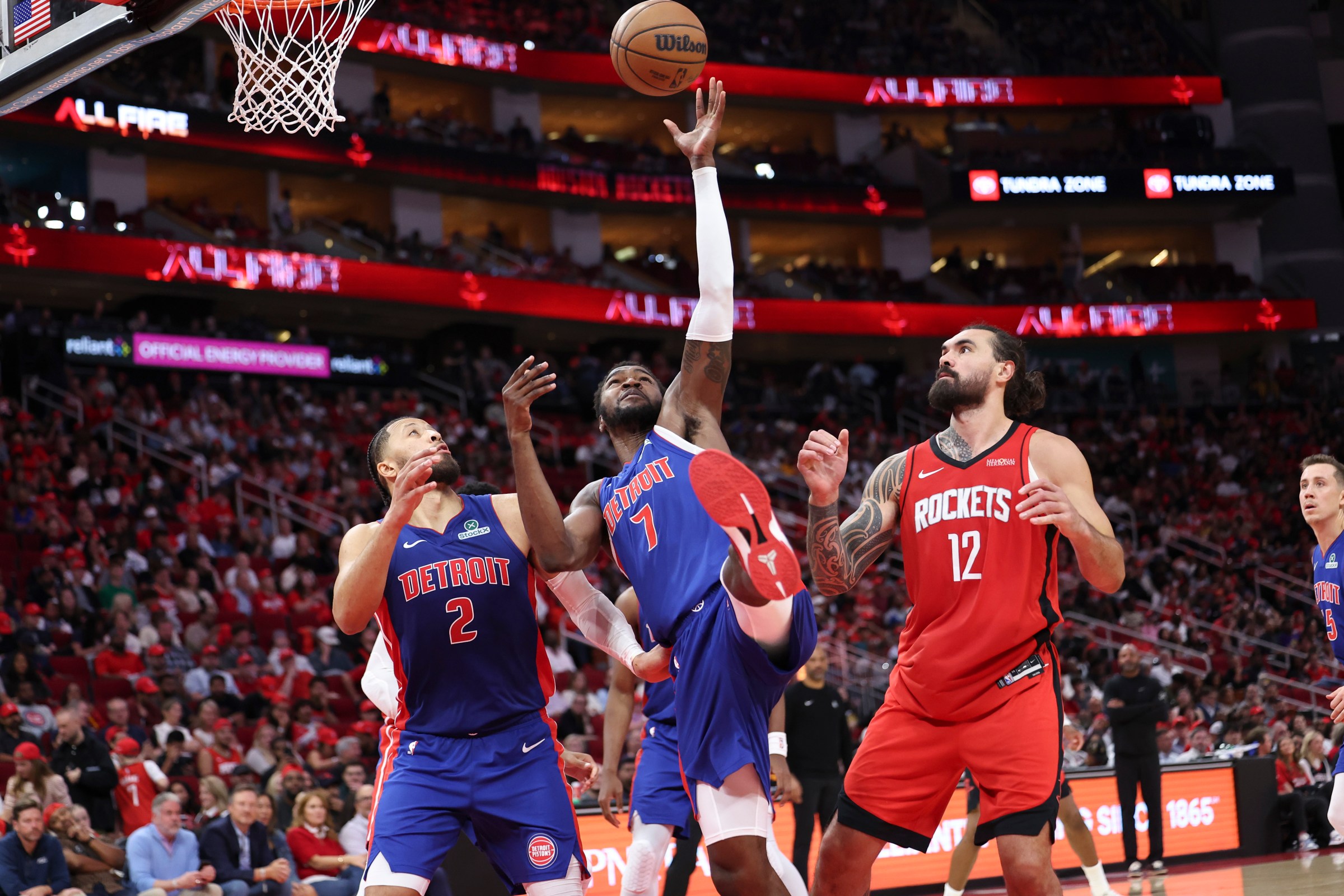 Oct 24, 2025; Houston, Texas, USA; Detroit Pistons forward Paul Reed (7) grabs a rebound during the second quarter against the Houston Rockets at Toyota Center. Mandatory Credit: Troy Taormina-Imagn Images