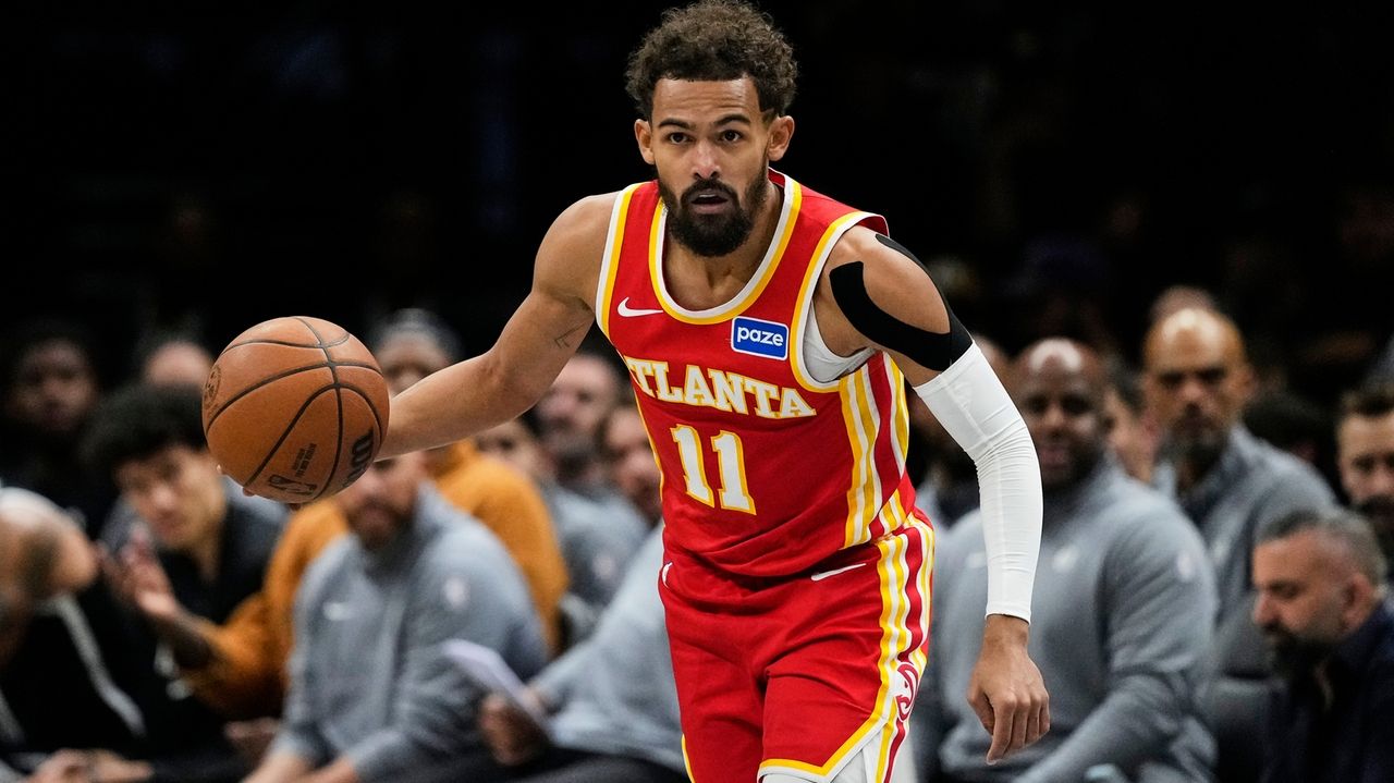 Hawks' Trae Young suffers sprained right knee vs. Nets