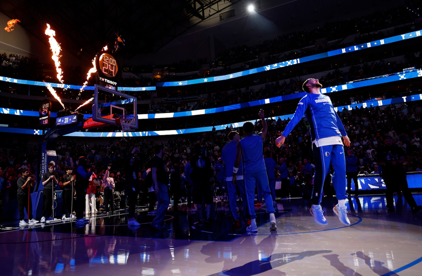 Dallas Mavericks guard Klay Thompson (31) leaps in the air after being introduced before the...
