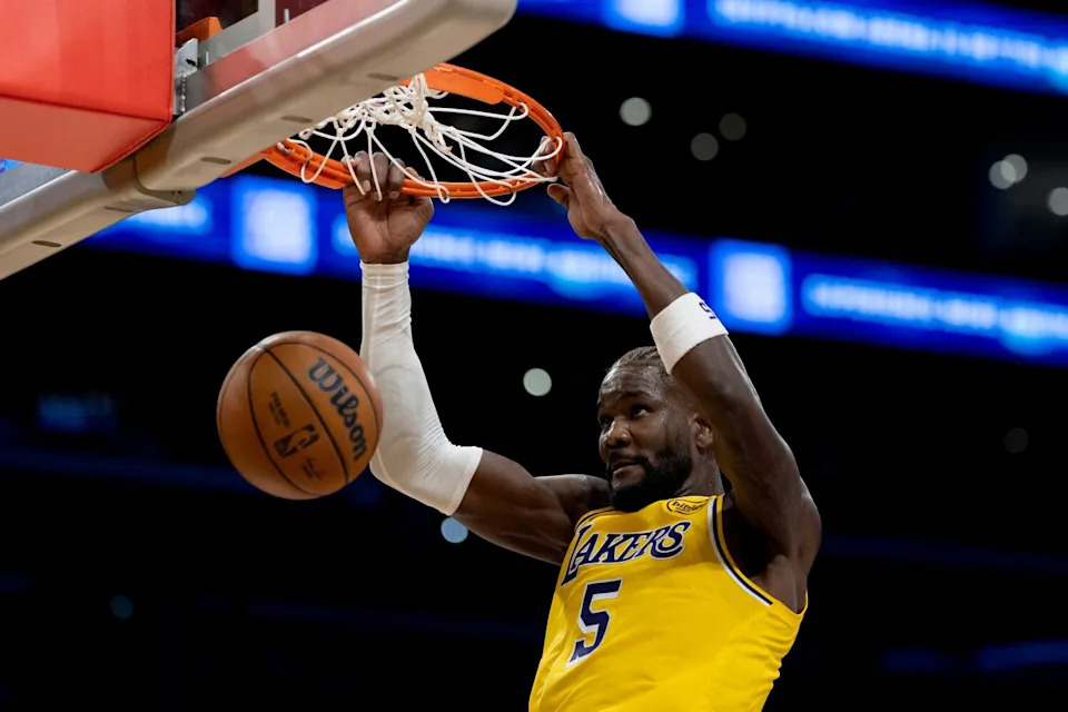 Lakers center Deandre Ayton dunks against the Minnesota Timberwolves in the second half Friday.