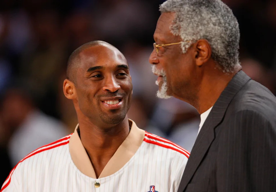 Feb. 17, 2008; New Orleans, LA, USA; Los Angeles Lakers' Kobe Bryant talks to Bill Russell during pre-game warm up before the annual NBA Al Star Game at the New Orleans Arena. Mandatory Credit: Robert Deutsch/USA TODAY NETWORK