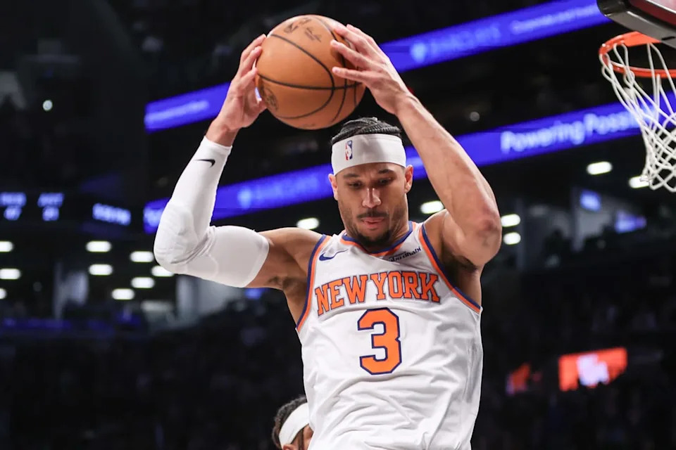 Jan 21, 2025; Brooklyn, New York, USA; New York Knicks guard Josh Hart (3) grabs a rebound in the fourth quarter against the Brooklyn Nets at Barclays Center. Mandatory Credit: Wendell Cruz-Imagn Images