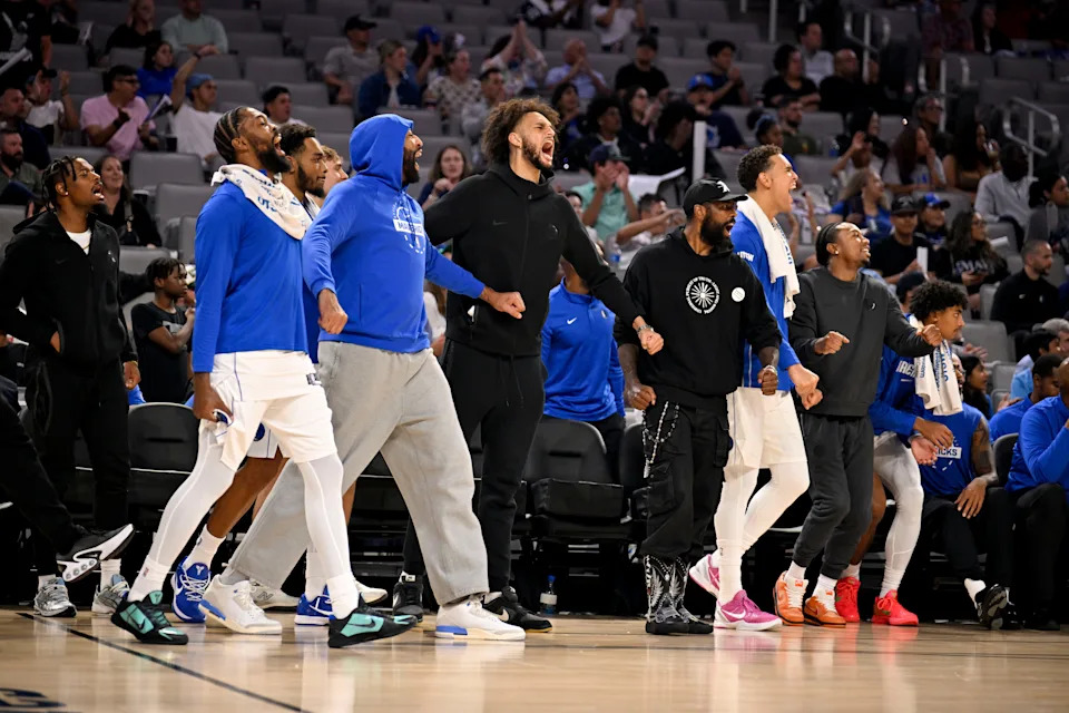 Oct 6, 2025; Fort Worth, Texas, USA; The Dallas Mavericks team bench celebrates during the second half against the Oklahoma City Thunder at Dickie's Arena. Mandatory Credit: Jerome Miron-Imagn Images