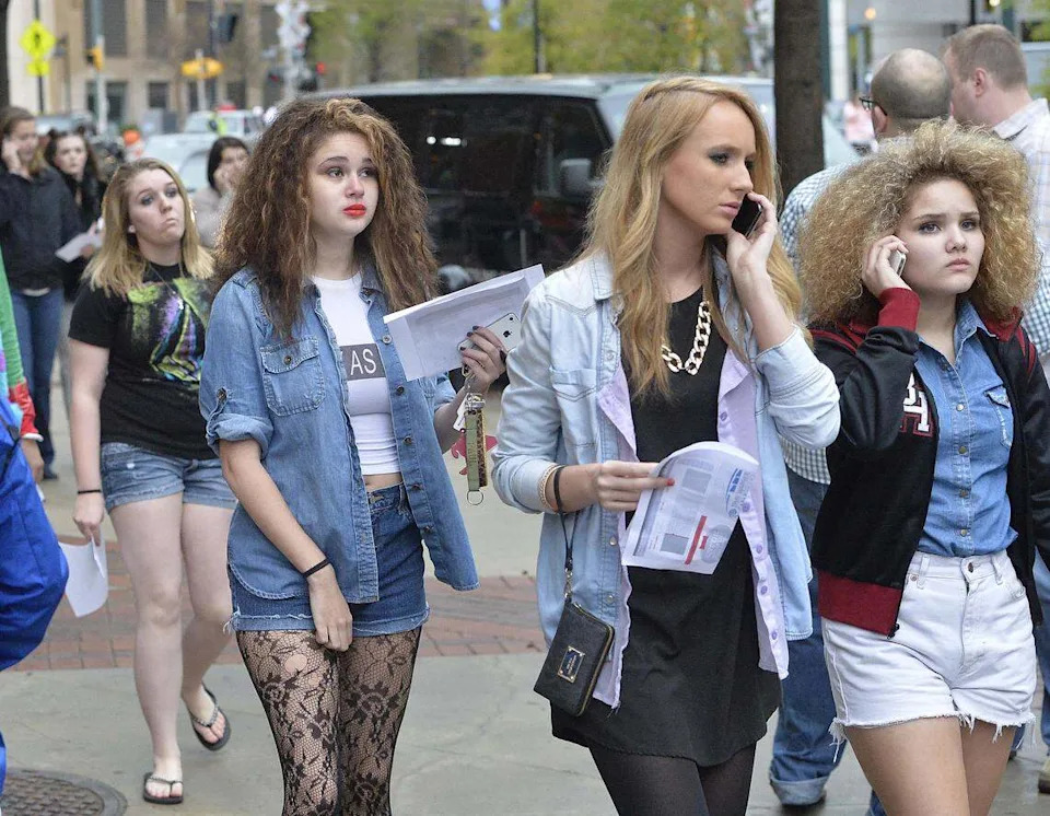 April 7, 2014: Miley Cyrus fans leave Time Warner Cable Arena after being told that the Miley Cyrus concert had been postponed at the last minute due to Cyrus coming down with an illness. 