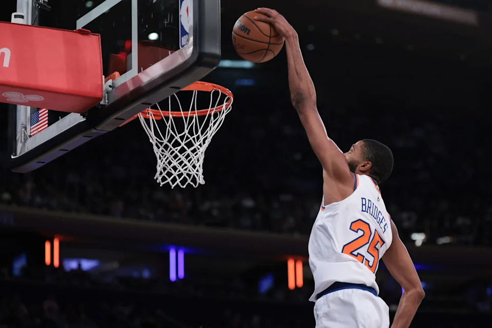 Oct 17, 2025; New York, New York, USA; New York Knicks guard/forward Mikal Bridges (25) goes up for a dunk during the second half against the Charlotte Hornets at Madison Square Garden.