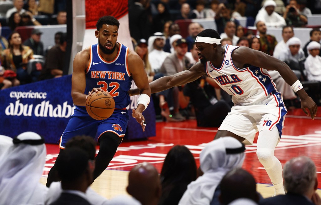 Karl-Anthony Towns in action with Adem Bona during the NBA game between the New York Knicks and the Philadelphia 76ers.