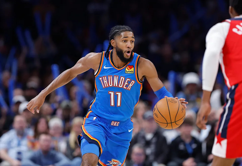 Oct 30, 2025; Oklahoma City, Oklahoma, USA; Oklahoma City Thunder guard Isaiah Joe (11) dribbles down the court against the Washington Wizards during the second half at Paycom Center. Mandatory Credit: Alonzo Adams-Imagn Images