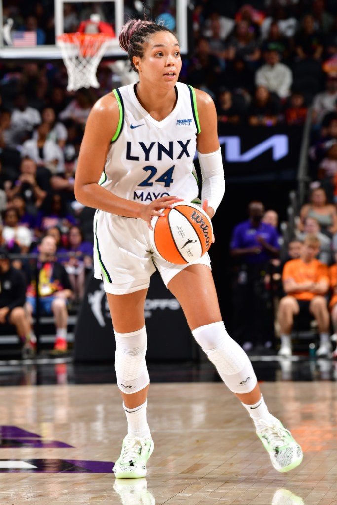 Napheesa Collier #24 of the Minnesota Lynx dribbles the ball during the game against the Phoenix Mercury during Game 3 of the WNBA semifinals on September 26, 2025 at PHX Arena in Phoenix, Arizona. 