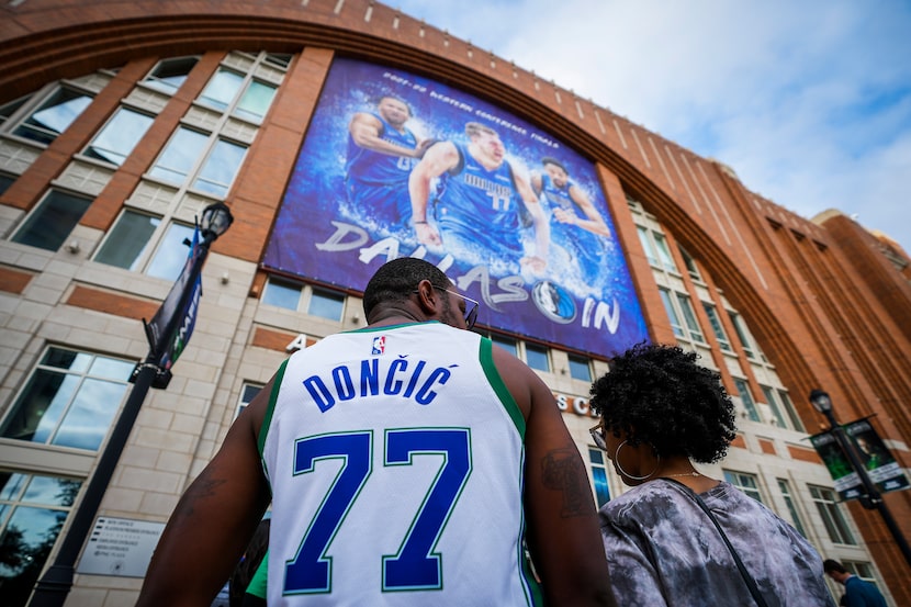 Dallas Mavericks fans wait to enter the arena before Game 3 of the NBA Western Conference...