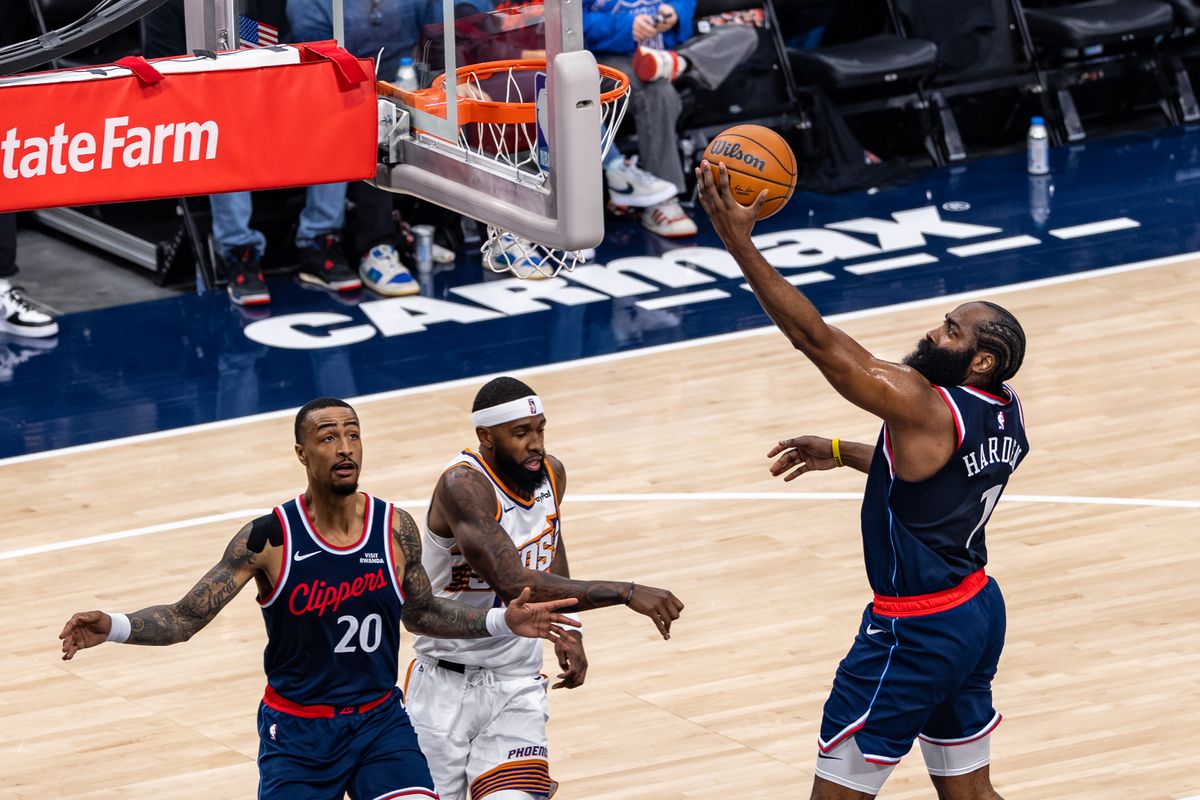 Guard James Harden #1 of the LA Clippers lays the ball up during an NBA game against the Phoenix Suns at the Intuit Dome on October 24, 2025 in Inglewood California.