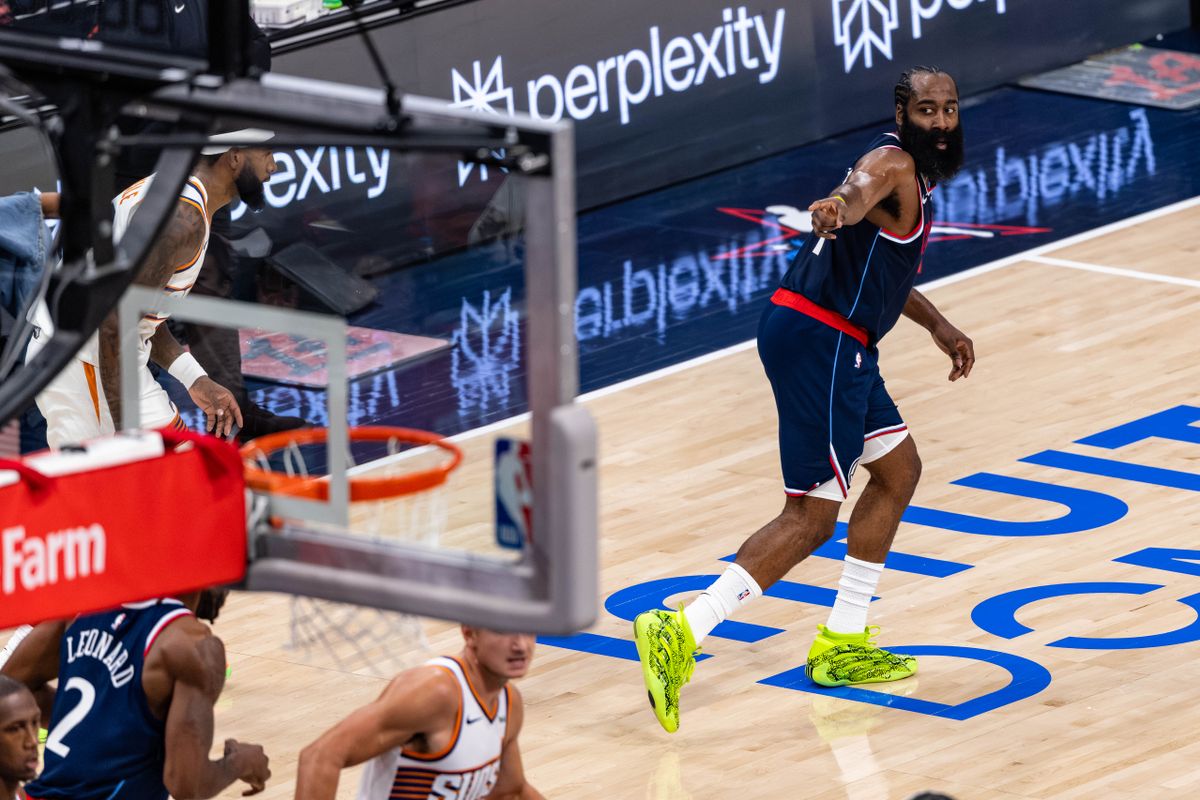 Guard James Harden #1 of the LA Clippers points to forward Kawhi Leonard #2 of the LA Clippers after hitting a shot during an NBA game against the Phoenix Suns at the Intuit Dome on October 24, 2025 in Inglewood California.