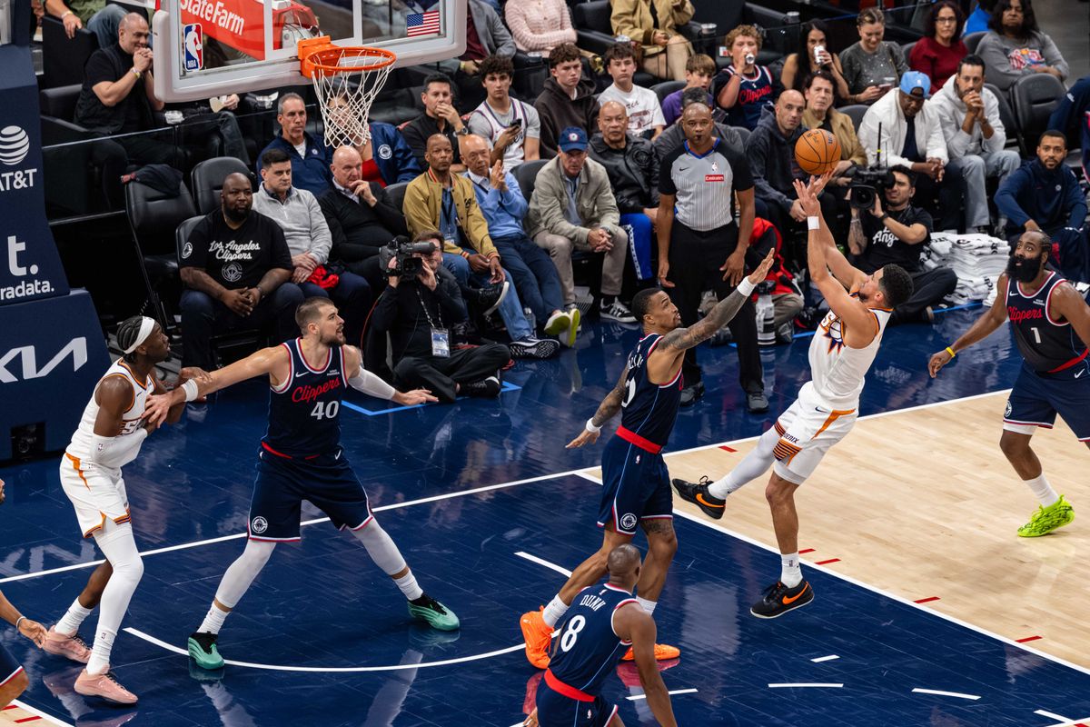 Guard Devin Booker #1 of the Phoenix Suns shoots over the defense during an NBA game against the LA Clippers at the Intuit Dome on October 24, 2025 in Inglewood California.