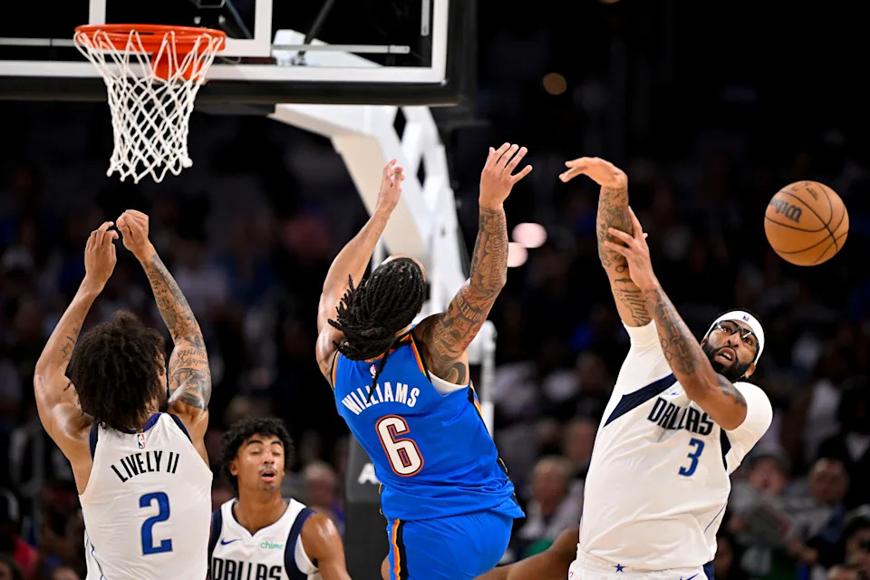 Oct 6, 2025; Fort Worth, Texas, USA; Dallas Mavericks forward/center Anthony Davis (3) blocks a shot by Oklahoma City Thunder forward Jaylin Williams (6) during the second quarter at Dickie's Arena. Mandatory Credit: Jerome Miron-Imagn Images