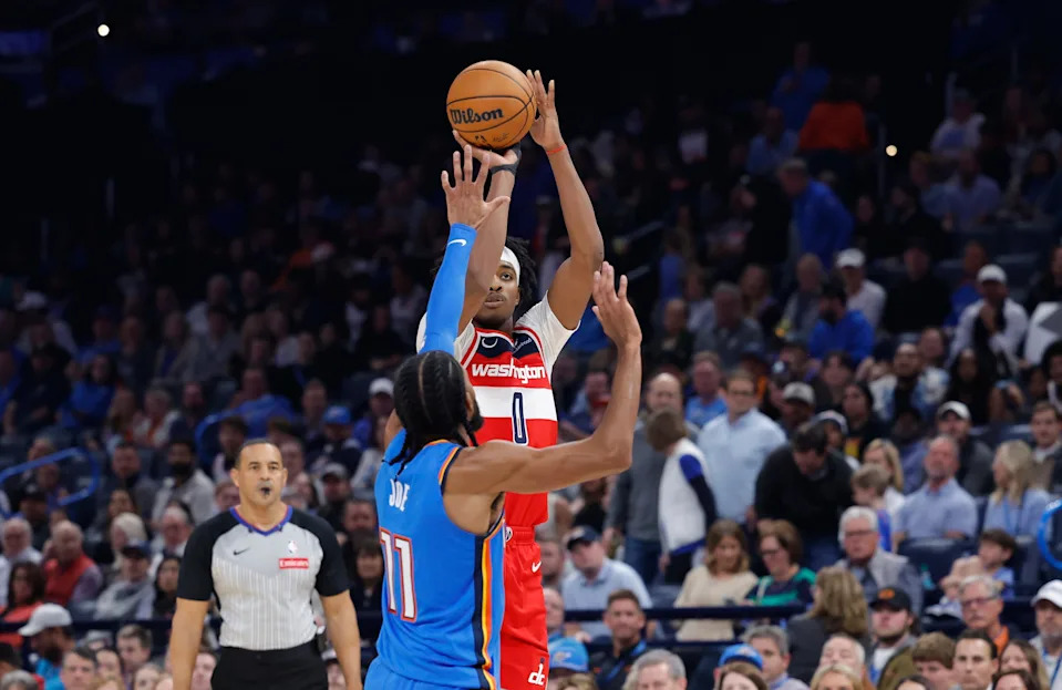 Oct 30, 2025; Oklahoma City, Oklahoma, USA; Washington Wizards guard Bilal Coulibaly (0) shoots over Oklahoma City Thunder guard Isaiah Joe (11) during the second quarter at Paycom Center. Mandatory Credit: Alonzo Adams-Imagn Images