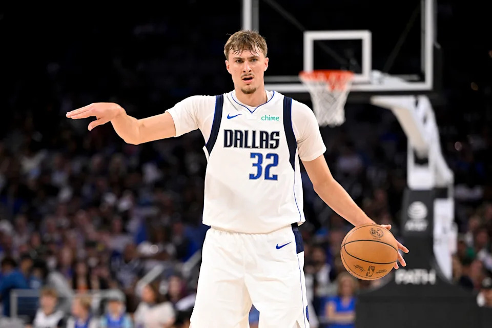 Oct 6, 2025; Fort Worth, Texas, USA; Dallas Mavericks forward Cooper Flagg (32) sets the play as he brings the ball up the court against the Oklahoma City Thunder during the second quarter at Dickie's Arena. Mandatory Credit: Jerome Miron-Imagn Images