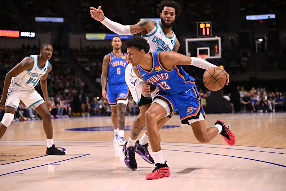 Oct 5, 2025; North Charleston, South Carolina, USA; Oklahoma City Thunder forward Ousmane Dieng (13) drives to the basket against the Charlotte Hornets in the first quarter at North Charleston Coliseum. Mandatory Credit: Arthur Ellis-Imagn Images