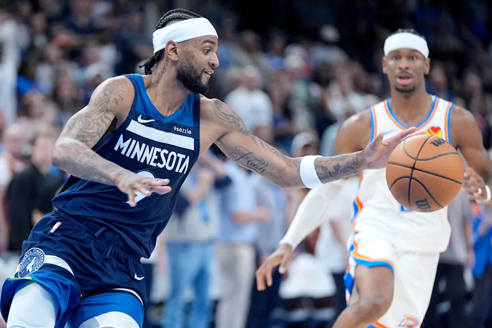Minnesota guard Nickeil Alexander-Walker (9) stalls for time in overtime during an NBA game between the Oklahoma City Thunder and the Minnesota Timberwolves at Paycom Center in Oklahoma City, on Monday, Feb. 24, 2025.