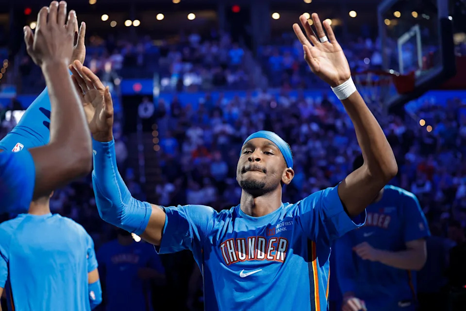 Oct 30, 2025; Oklahoma City, Oklahoma, USA; Oklahoma City Thunder guard Shai Gilgeous-Alexander (2) high fives his team during introductions before the start of a game against the Washington Wizards at Paycom Center. Mandatory Credit: Alonzo Adams-Imagn Images