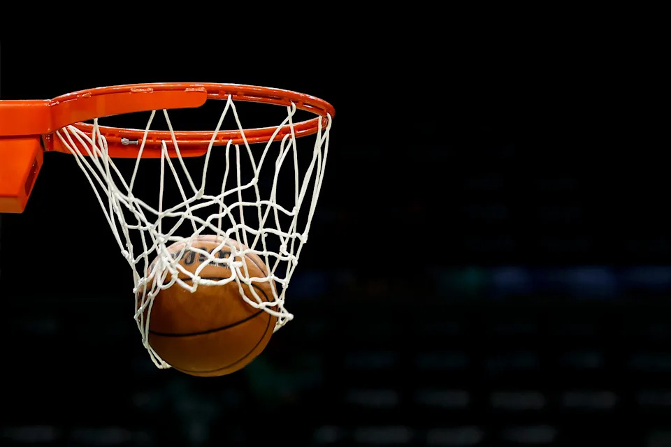 Oct 22, 2025; Boston, Massachusetts, USA; A Wilson NBA basketball goes through the net before the game between the Boston Celtics and the Philadelphia 76ers at TD Garden. Mandatory Credit: Winslow Townson-Imagn Images