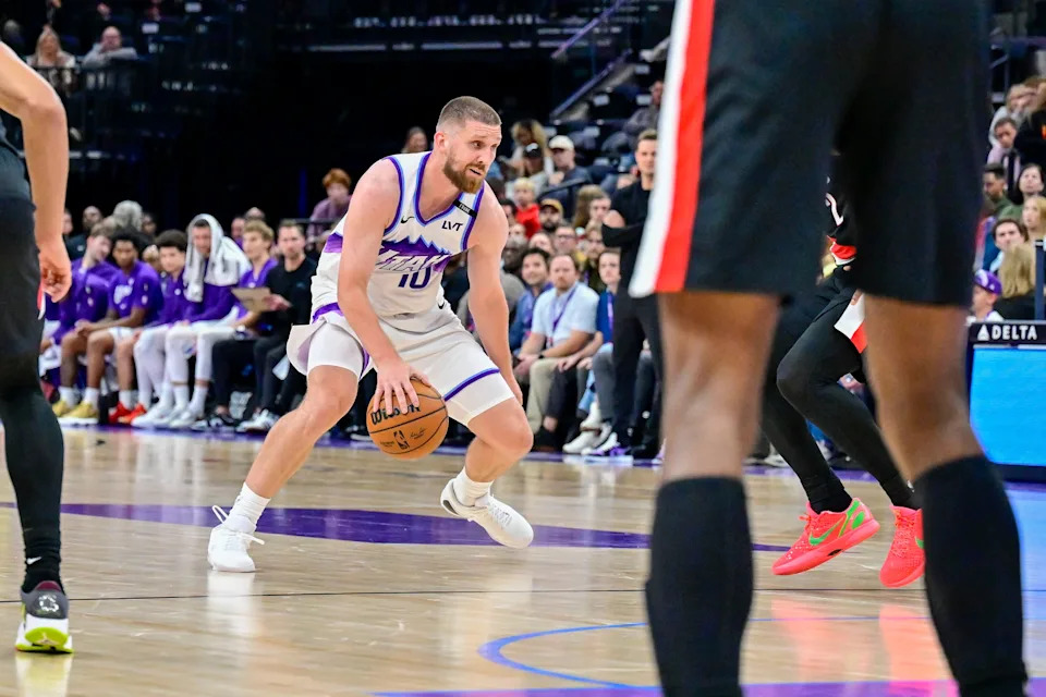 Oct 16, 2025; Salt Lake City, Utah, USA; Utah Jazz guard/forward Svi Mykhailiuk (10) plans his next move against Portland Trail Blazers guard Caleb Love (2) during the second half at Delta Center.