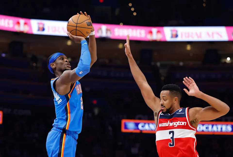 Oct 30, 2025; Oklahoma City, Oklahoma, USA; Oklahoma City Thunder guard Shai Gilgeous-Alexander (2) shoots over Washington Wizards guard CJ McCollum (3) during the second half at Paycom Center. Mandatory Credit: Alonzo Adams-Imagn Images